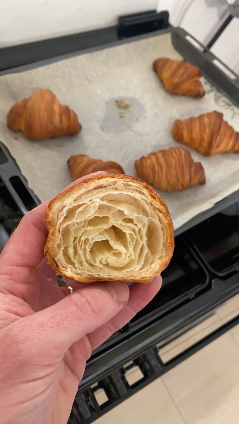Baked croissants on a tray